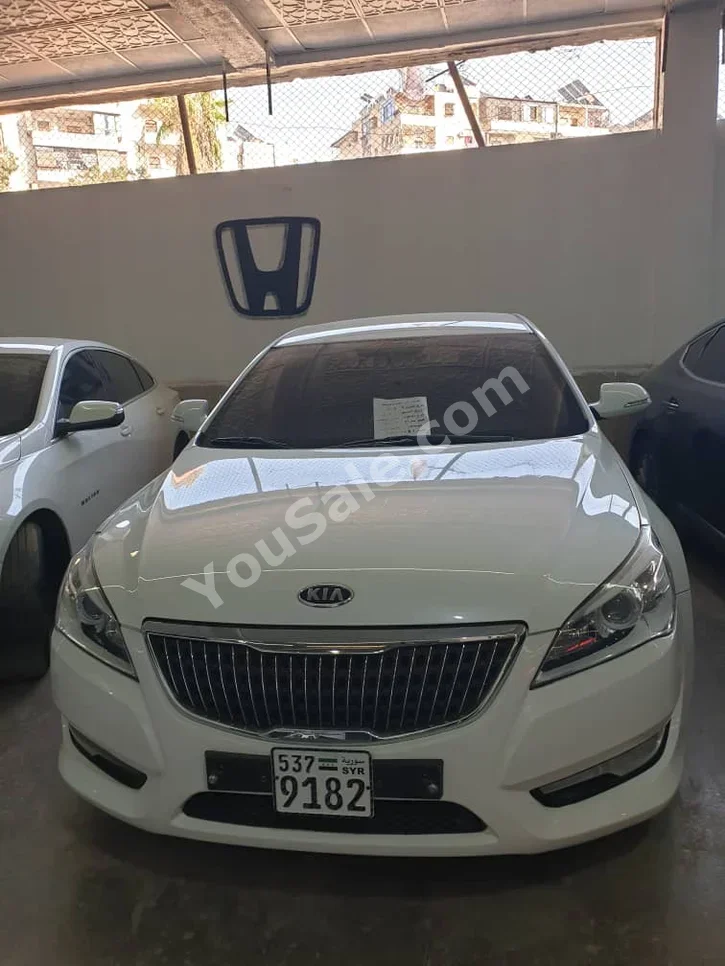 Kia  K7  2011  Automatic  81,000 km  6 Cylinder  FWD  Sedan  White  Gasoline