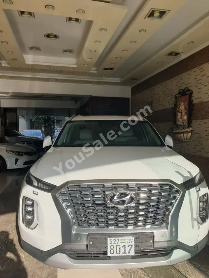 هيونداي  باليسيد  2020  اتوماتيك  135,000 كم  6 سلندر  دفع رباعي  اس يو في  أبيض  بنزين