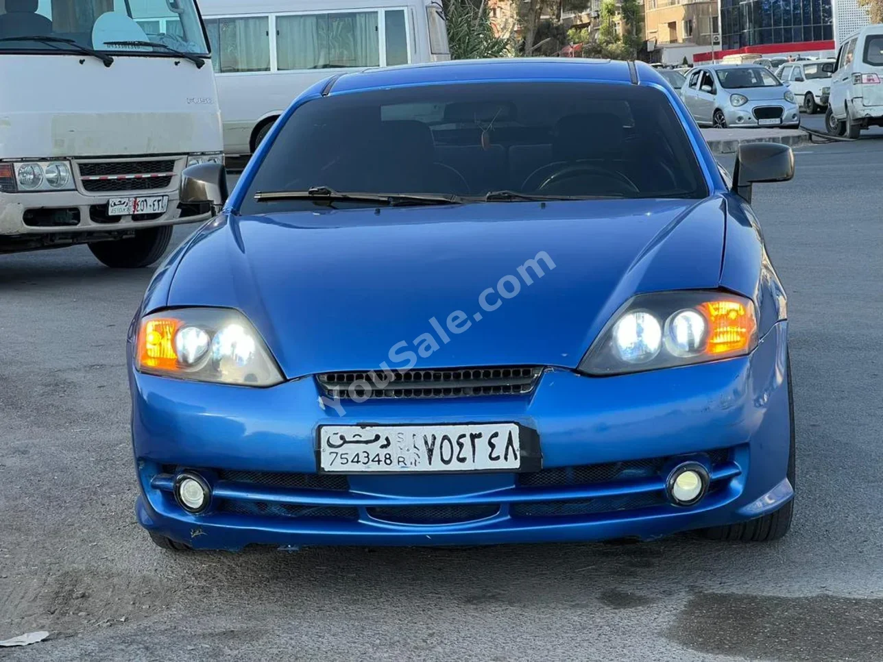 هيونداي  كوبيه اف اكس  2007  اتوماتيك  130,000 كم  4 سلندر  دفع أمامي  كوبيه \ سبورت  ازرق  بنزين