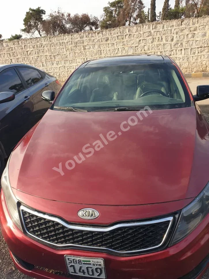 Kia  Optima  2012  Automatic  212,000 km  4 Cylinder  FWD  Sedan  Red  Gasoline