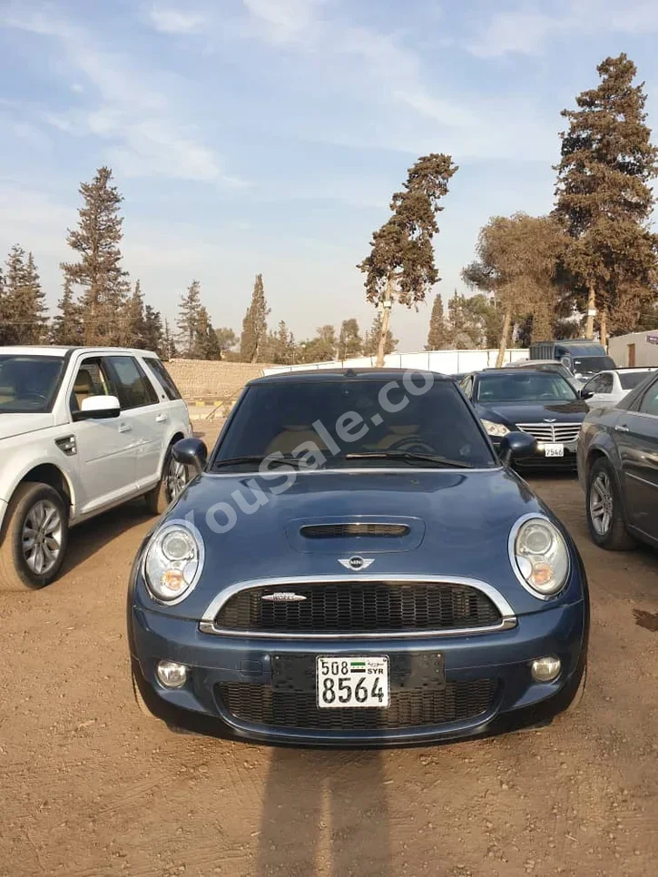 Mini  Cooper  S  2012  Automatic  124,000 km  4 Cylinder  FWD  Coupe / Sport  Dark Blue  Gasoline