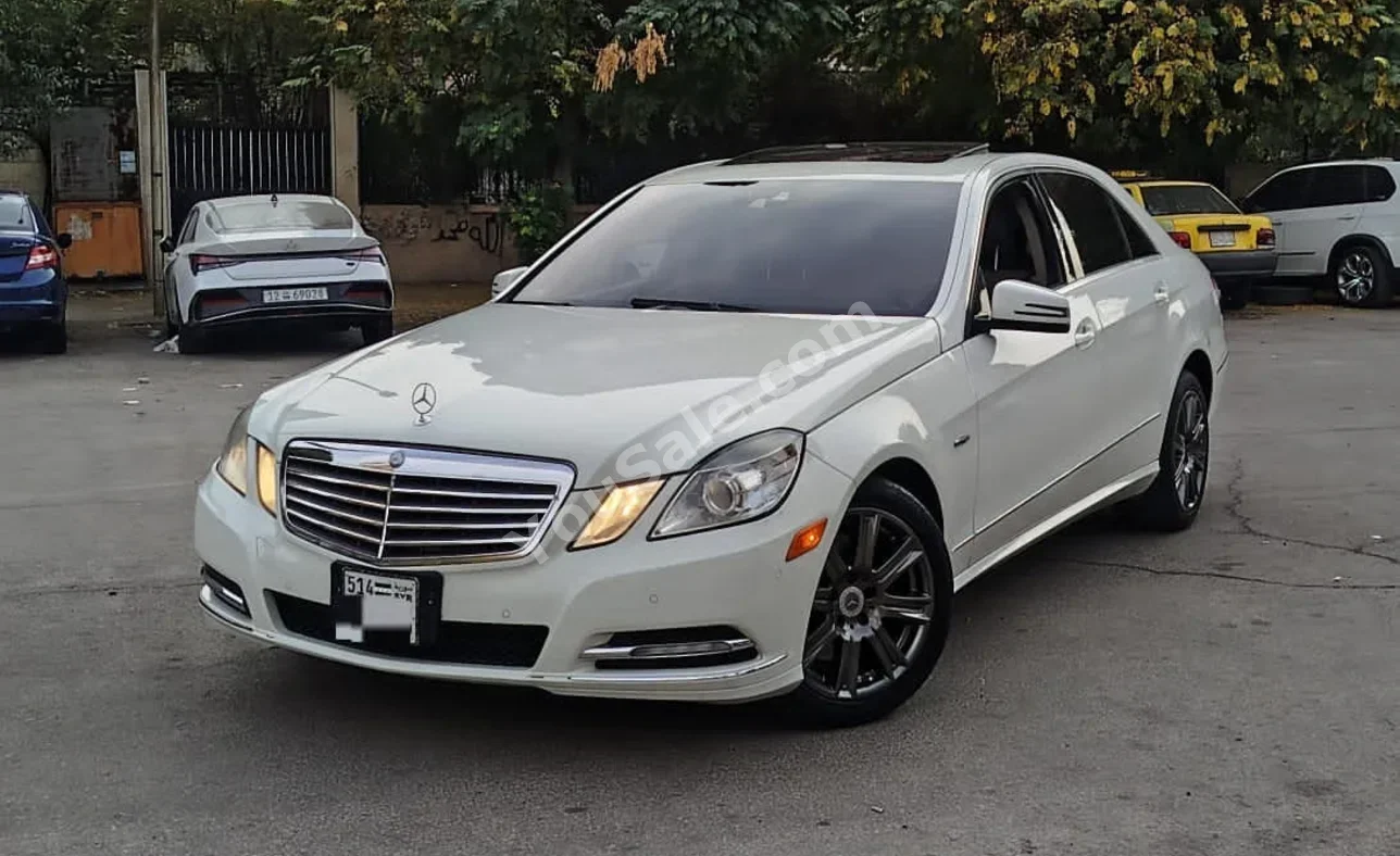 Mercedes-Benz  E-Class  350  2012  Automatic  140,000 km  6 Cylinder  RWD  Sedan  White  Gasoline