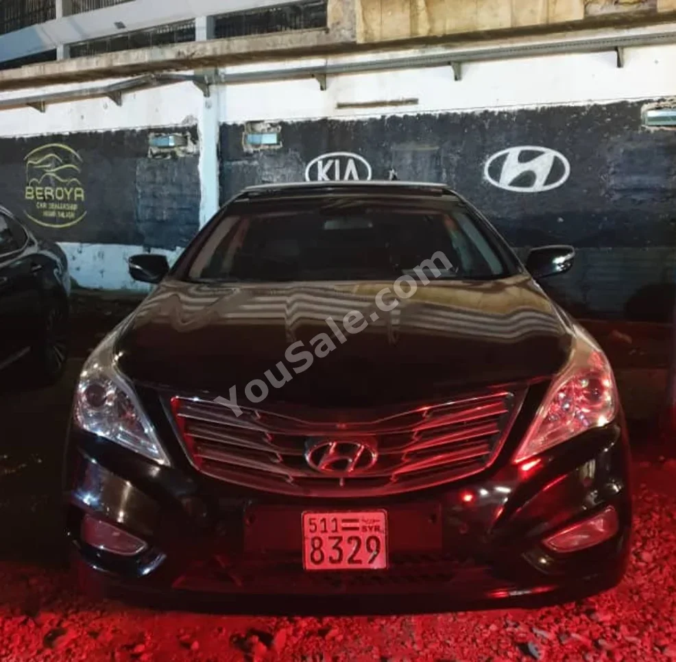 Hyundai Grandeur 2011 Automatic 83,000 km 4 Cylinder FWD Sedan Black Gasoline