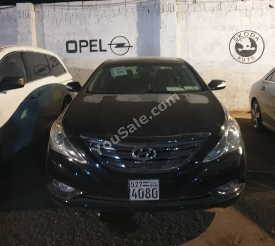 Hyundai  Sonata  2014  Automatic  289,000 km  4 Cylinder  FWD  Sedan  Black  Gasoline