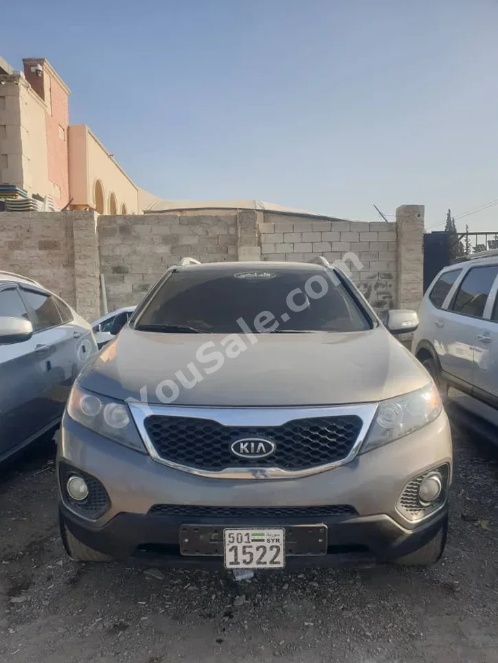 Kia  Sorento  2010  Automatic  263,000 km  4 Cylinder  FWD  SUV  Gray  Diesel