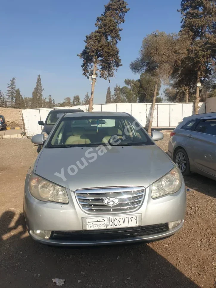 Hyundai  Avante  2007  Automatic  221,000 km  4 Cylinder  FWD  Sedan  Silver  Gasoline
