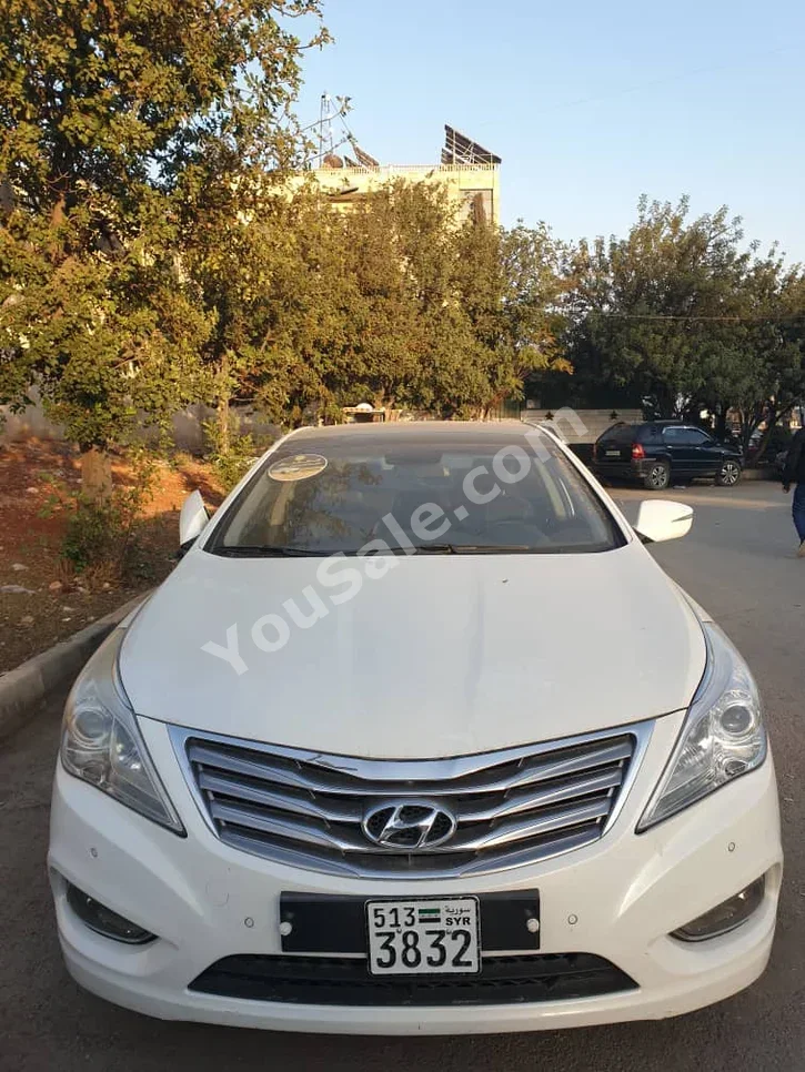 Hyundai Grandeur 2011 Automatic 130,000 km 4 Cylinder FWD Sedan White Gasoline