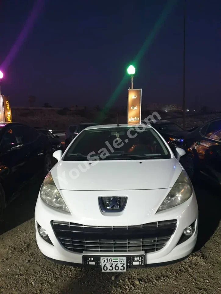 Peugeot  207  cc  2011  Manual  212,000 km  4 Cylinder  FWD  Coupe / Sport  White  Gasoline