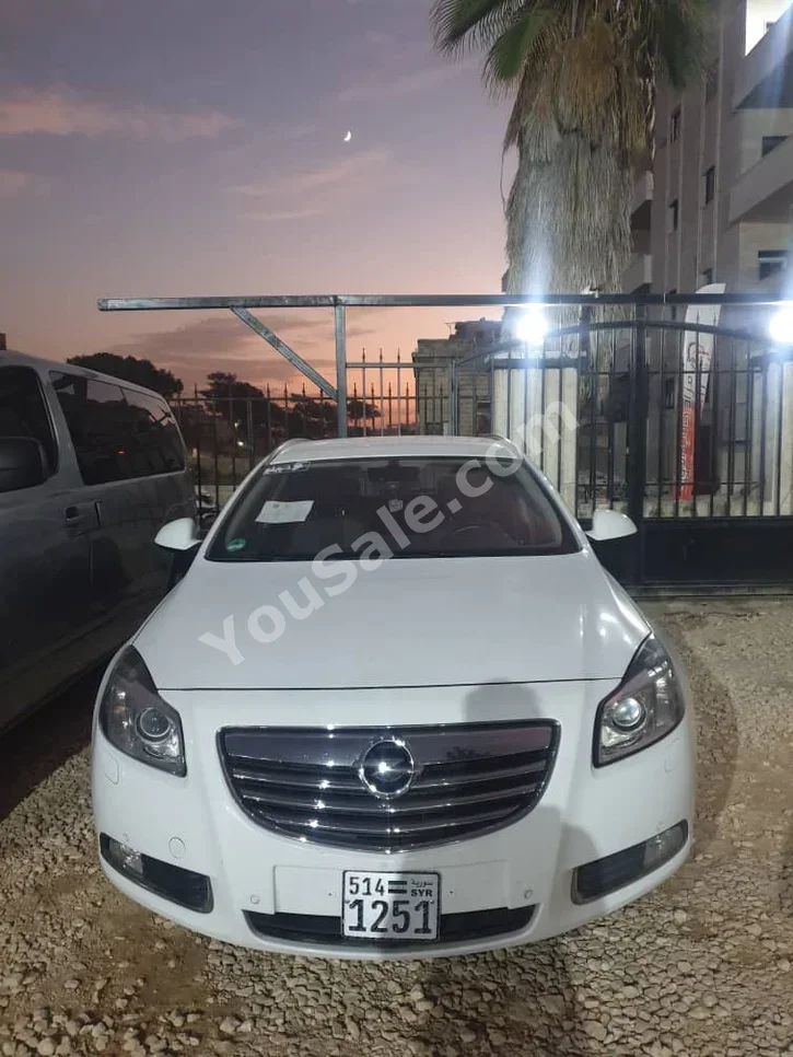 Opel Astra 2012 Automatic 316,000 km 4 Cylinder FWD Hatchback White Diesel