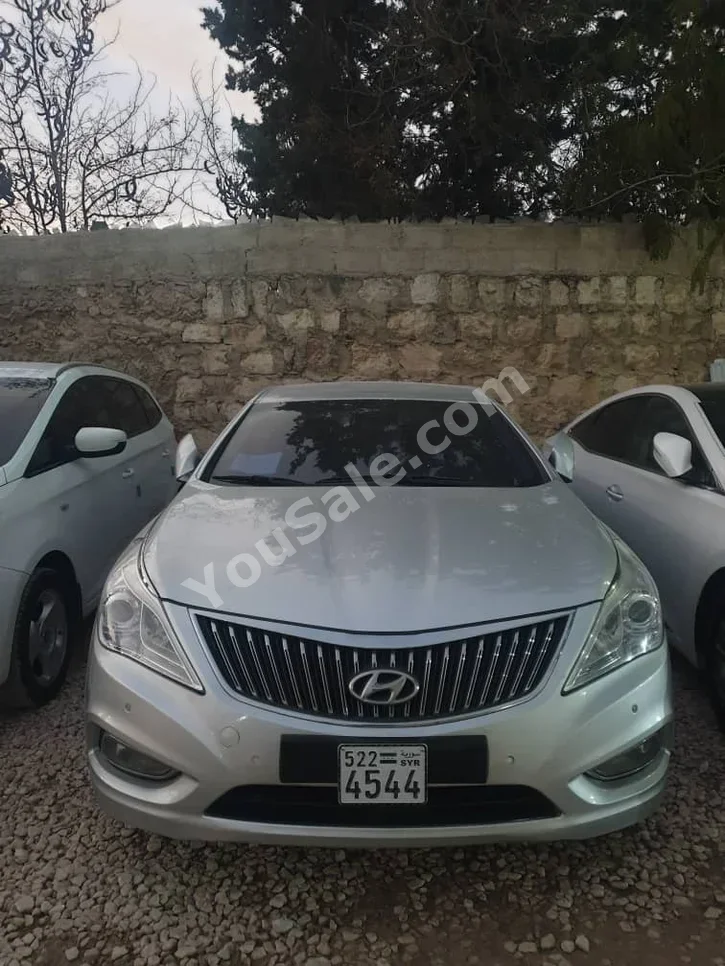 Hyundai Grandeur 2011 Automatic 66,000 km 4 Cylinder FWD Sedan Silver Gasoline