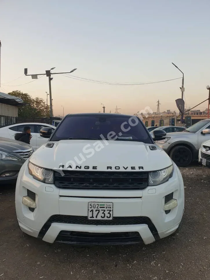 Land Rover Evoque 2012 Automatic 112,000 km 6 Cylinder 4WD Coupe / Sport White Gasoline