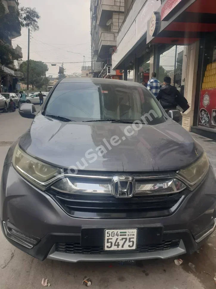 Honda  CRV  2018  Automatic  176,000 km  4 Cylinder  RWD  SUV  Gray  Gasoline