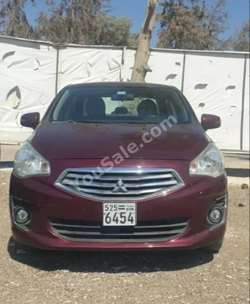 Mitsubishi  Attrage  2020  Automatic  186,000 km  4 Cylinder  FWD  Sedan  Dark Red  Gasoline