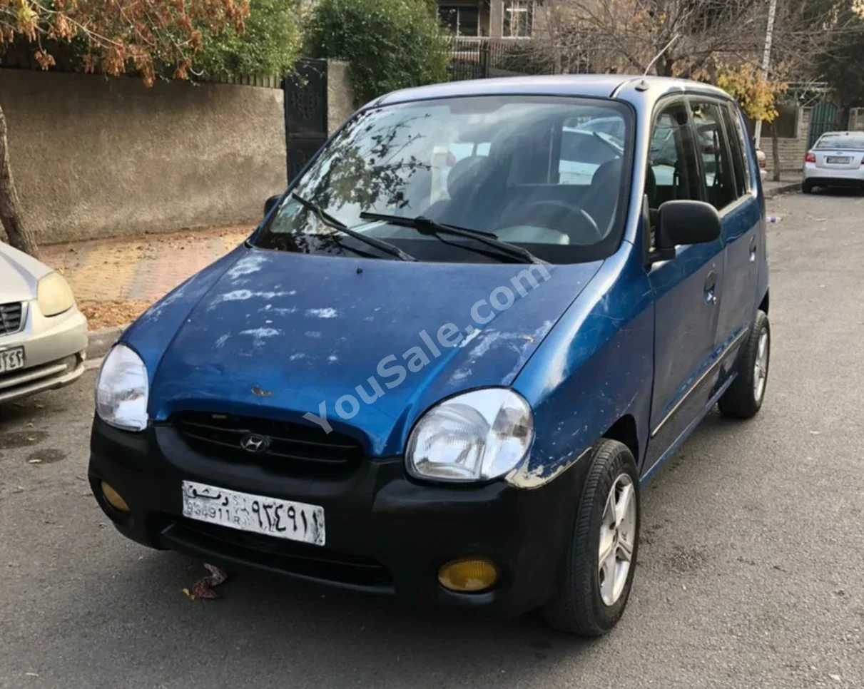 هيونداي اتوز 1999 عادي 360,000 كم 4 سلندر دفع أمامي هاتشباك ازرق بنزين