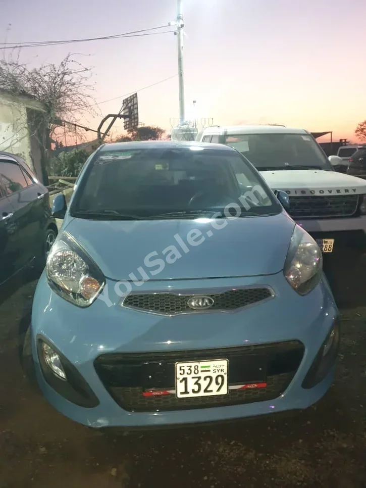 Kia  Picanto  2012  Automatic  165,000 km  4 Cylinder  FWD  Hatchback  Sky Blue  Gasoline
