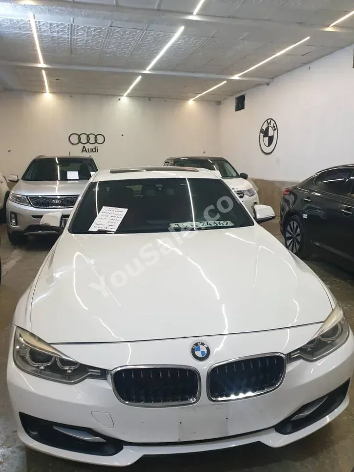 BMW  3-Series  328i  2012  Automatic  150,000 km  6 Cylinder  RWD  Sedan  White  Gasoline