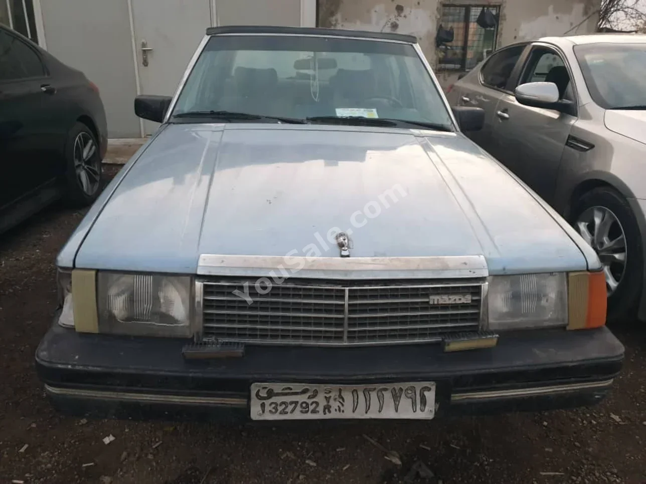 مازدا 929 1983 عادي 200,000 كم 4 سلندر دفع أمامي سيدان سمائي بنزين