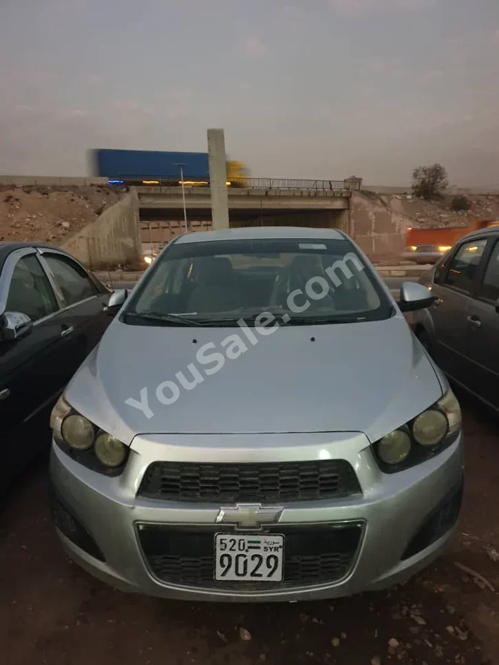 Chevrolet Sonic 2014 Automatic 130,000 km 4 Cylinder FWD Sedan Silver Gasoline