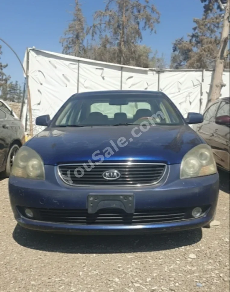 Kia  Optima  2012  Automatic  171,000 km  4 Cylinder  FWD  Sedan  Dark Blue  Gasoline