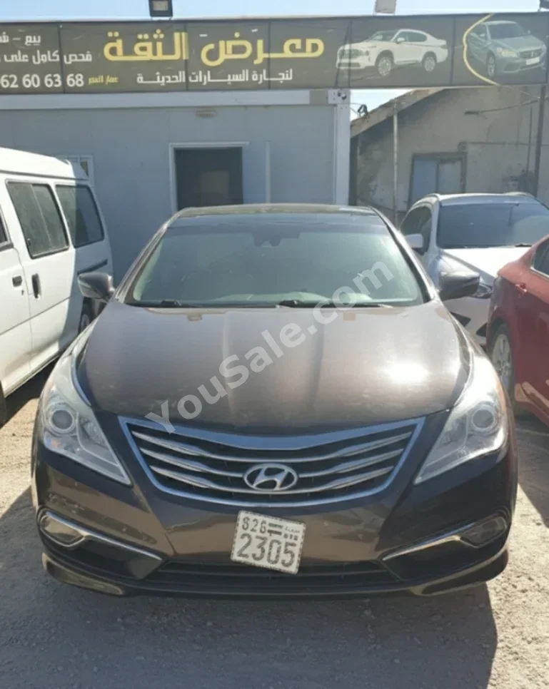 Hyundai  Azera  2012  Automatic  160,000 km  4 Cylinder  FWD  Sedan  Brown  Gasoline