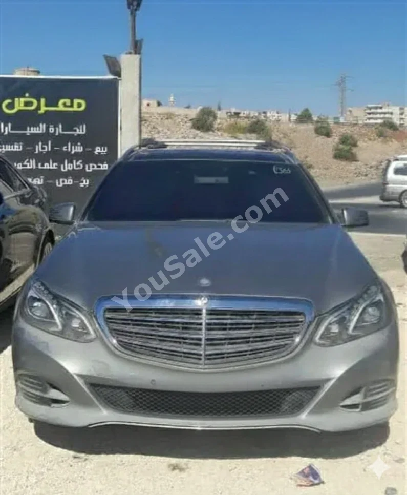 Mercedes-Benz  E-Class  300  2013  Automatic  166,000 km  6 Cylinder  4WD  Hatchback  Silver  Gasoline