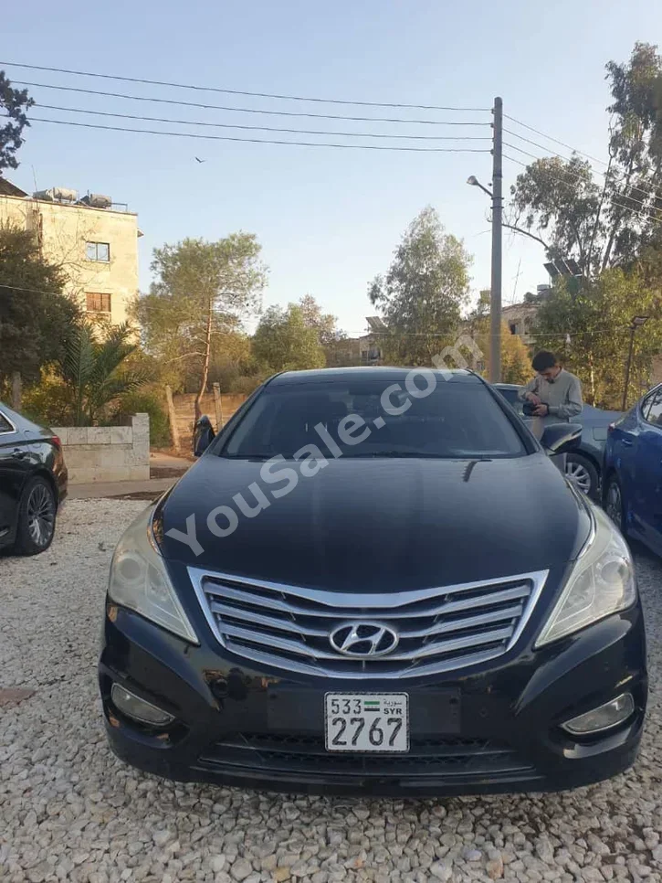 Hyundai Grandeur 2013 Automatic 127,000 km 4 Cylinder FWD Sedan Black Gasoline