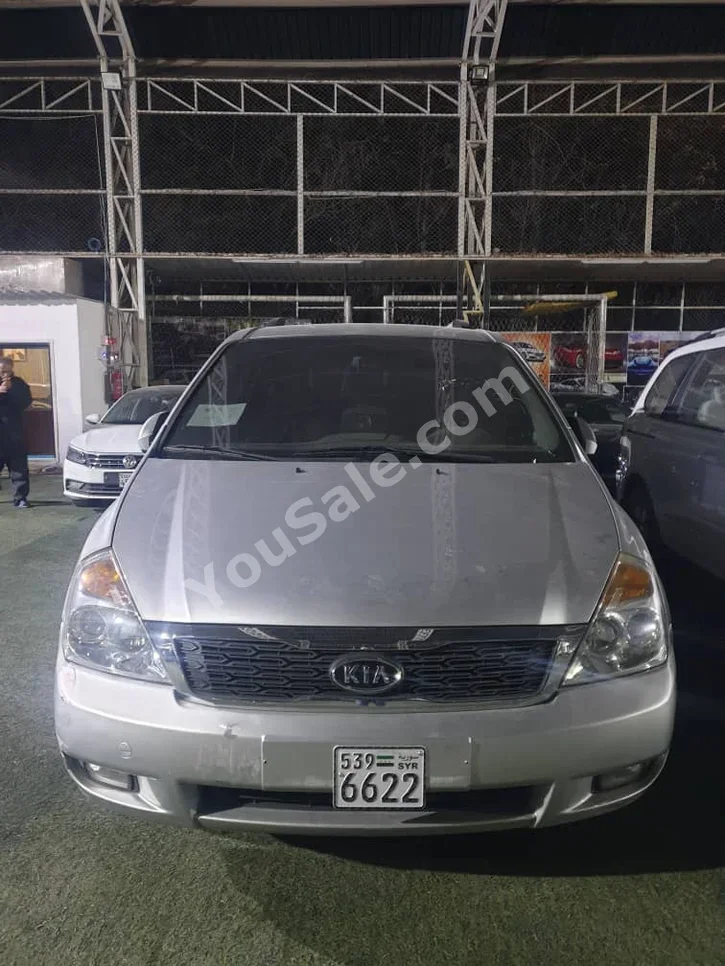 Kia  Carnival  2012  Automatic  88,000 km  4 Cylinder  FWD  Van / Bus  Silver  Gasoline