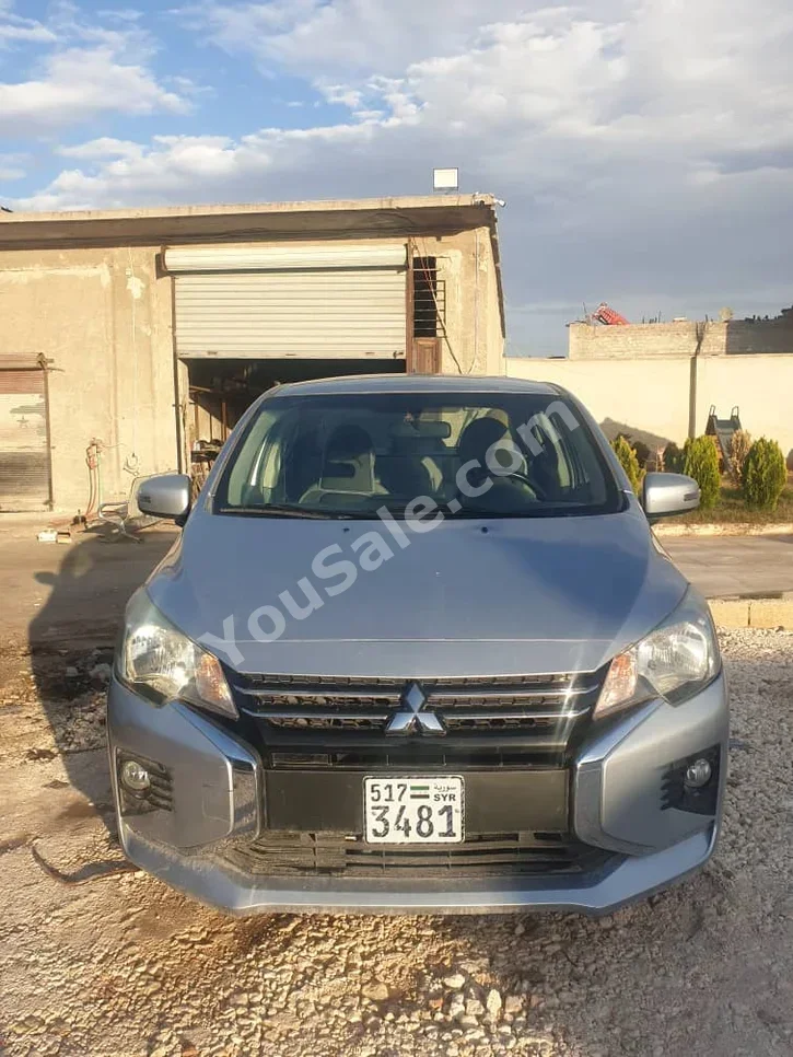 Mitsubishi  Attrage  2021  Automatic  75,000 km  4 Cylinder  FWD  Sedan  Silver  Gasoline