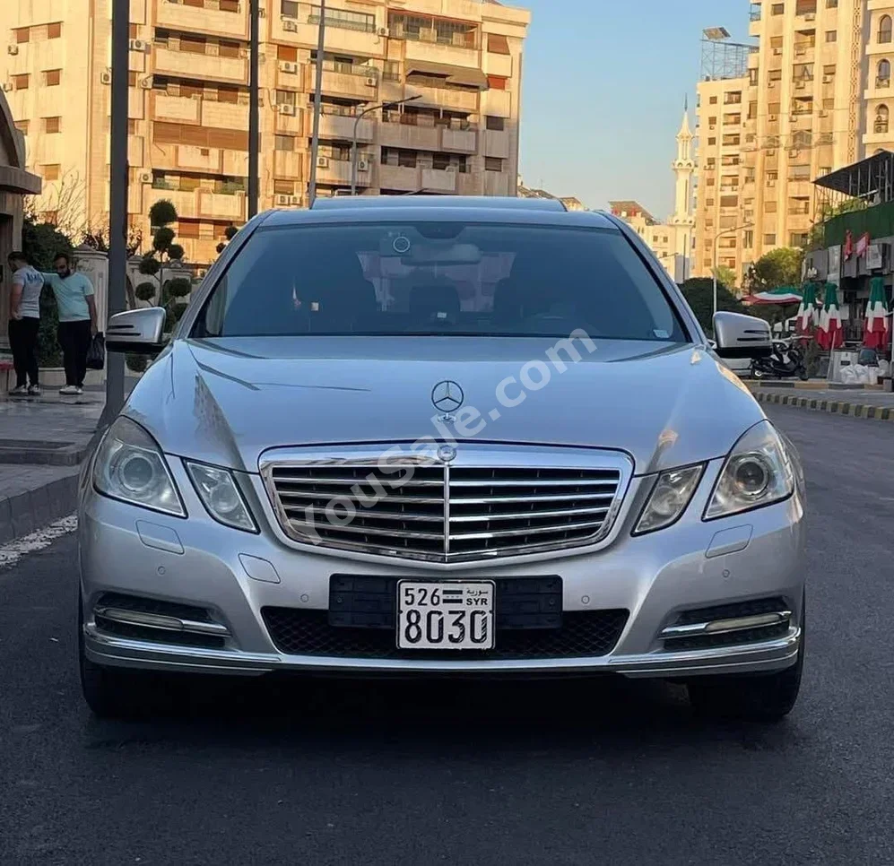 Mercedes-Benz  E-Class  300  2011  Automatic  190,000 km  6 Cylinder  RWD  Sedan  Silver  Gasoline
