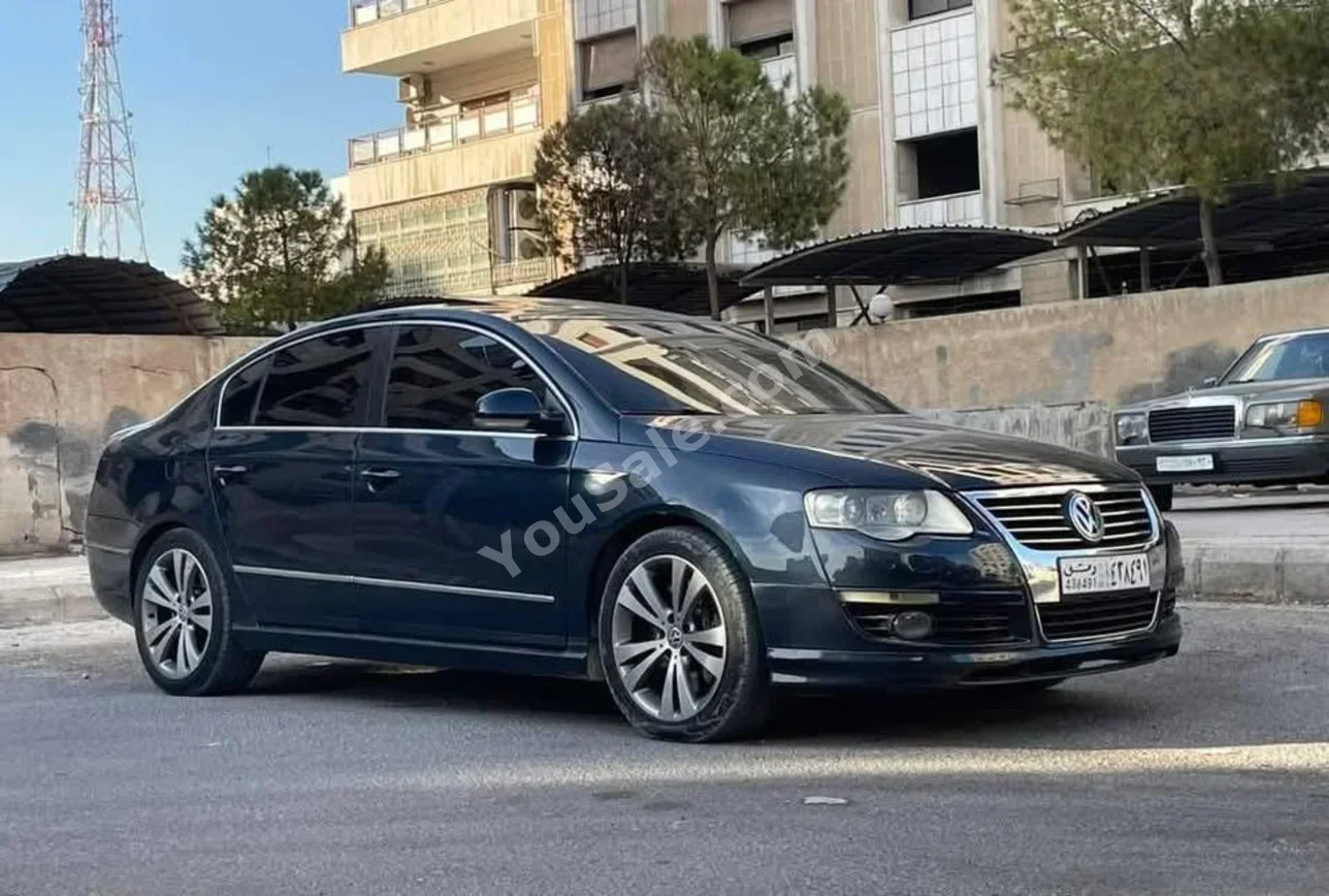 Volkswagen  Passat  2006  Automatic  110,000 km  4 Cylinder  FWD  Sedan  Black  Gasoline