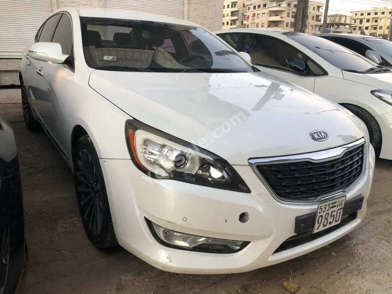 Kia  K7  2013  Automatic  157,000 km  4 Cylinder  FWD  Sedan  White  Gasoline