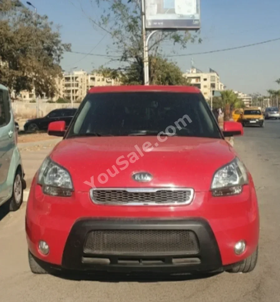 Kia  Soul  2012  Automatic  115,000 km  4 Cylinder  FWD  Hatchback  Red  Gasoline