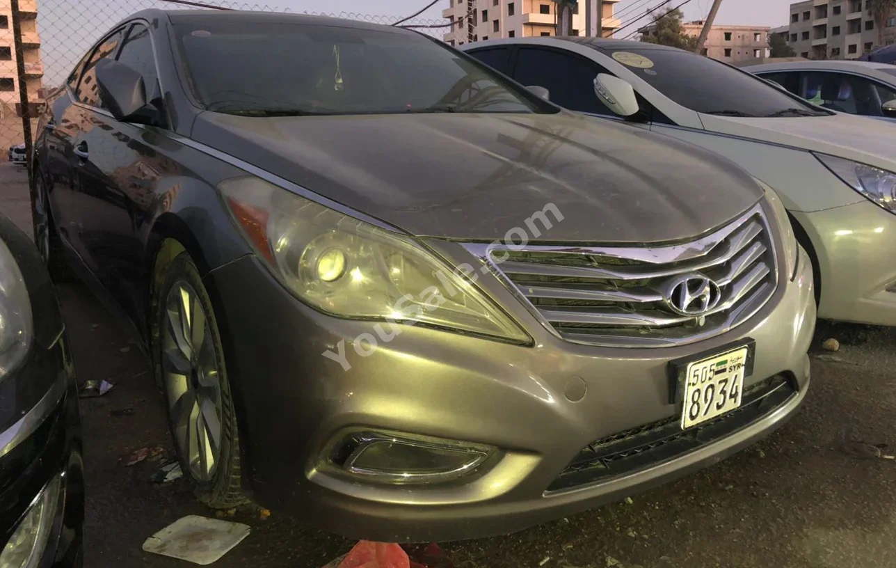 Hyundai Azera 2012 Automatic 155,000 km 4 Cylinder FWD Sedan Gold Gasoline