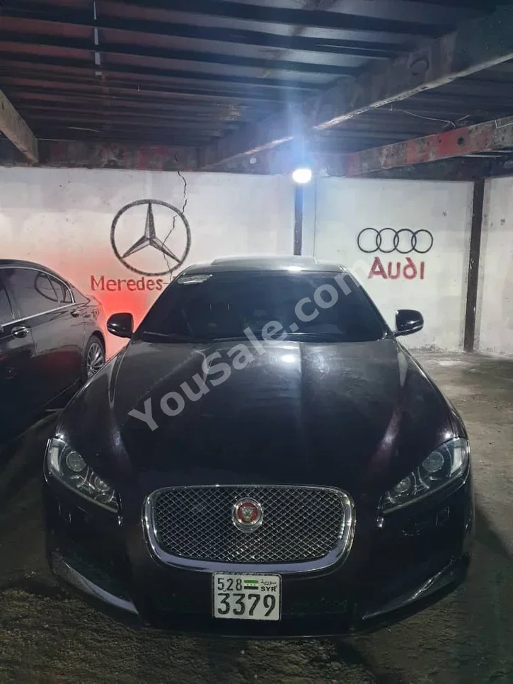 Jaguar  XF  2016  Automatic  260,000 km  4 Cylinder  RWD  Sedan  Dark Red  Diesel