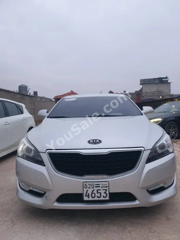 Kia  K7  2012  Automatic  237,000 km  4 Cylinder  FWD  Sedan  Silver  Gasoline