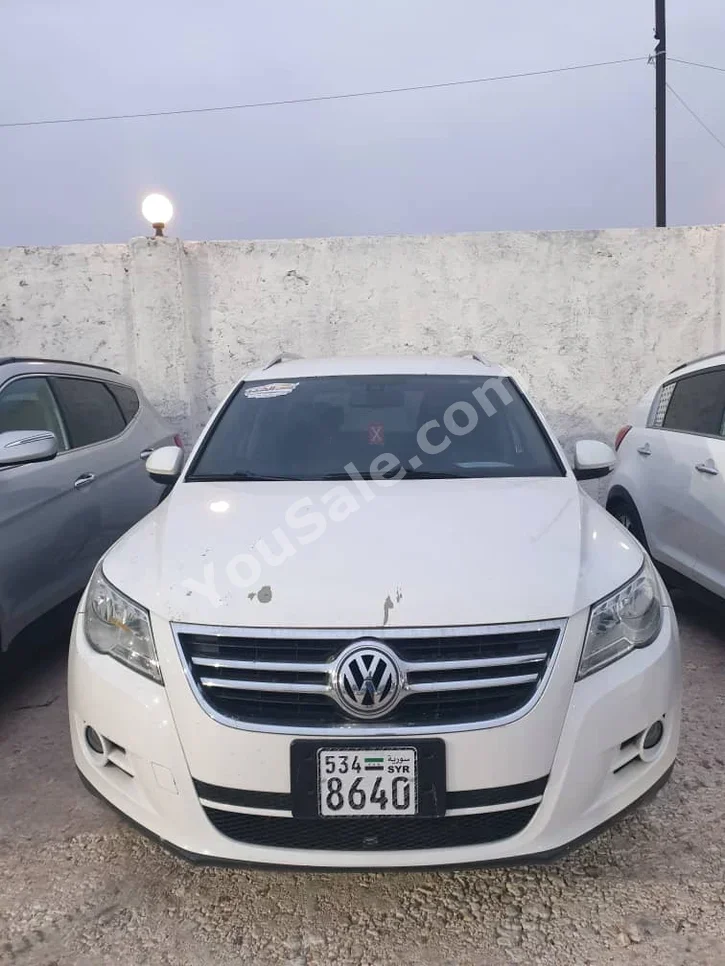 Volkswagen TIGUAN 2.0 TSI 2011 Automatic 234,000 km 4 Cylinder FWD SUV White Gasoline