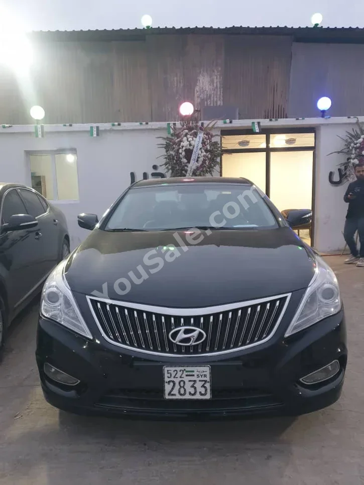 Hyundai  Grandeur  2012  Automatic  67,000 km  6 Cylinder  FWD  Sedan  Black  Gasoline