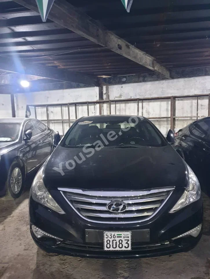 هيونداي سوناتا 2014 اتوماتيك 209,000 كم 4 سلندر دفع أمامي سيدان أسود بنزين