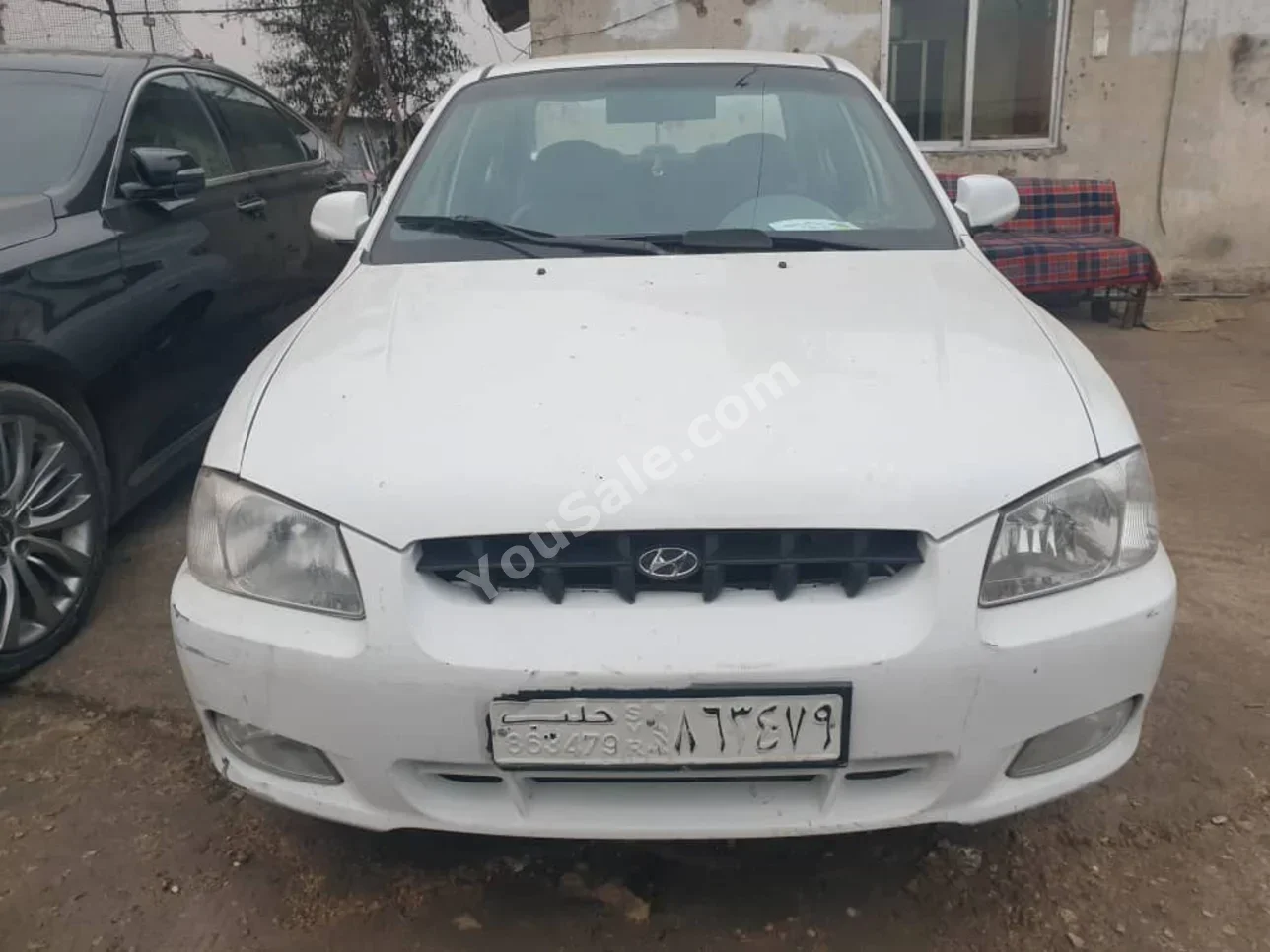 Hyundai  Accent  2004  Manual  150,000 km  4 Cylinder  FWD  Sedan  White  Gasoline