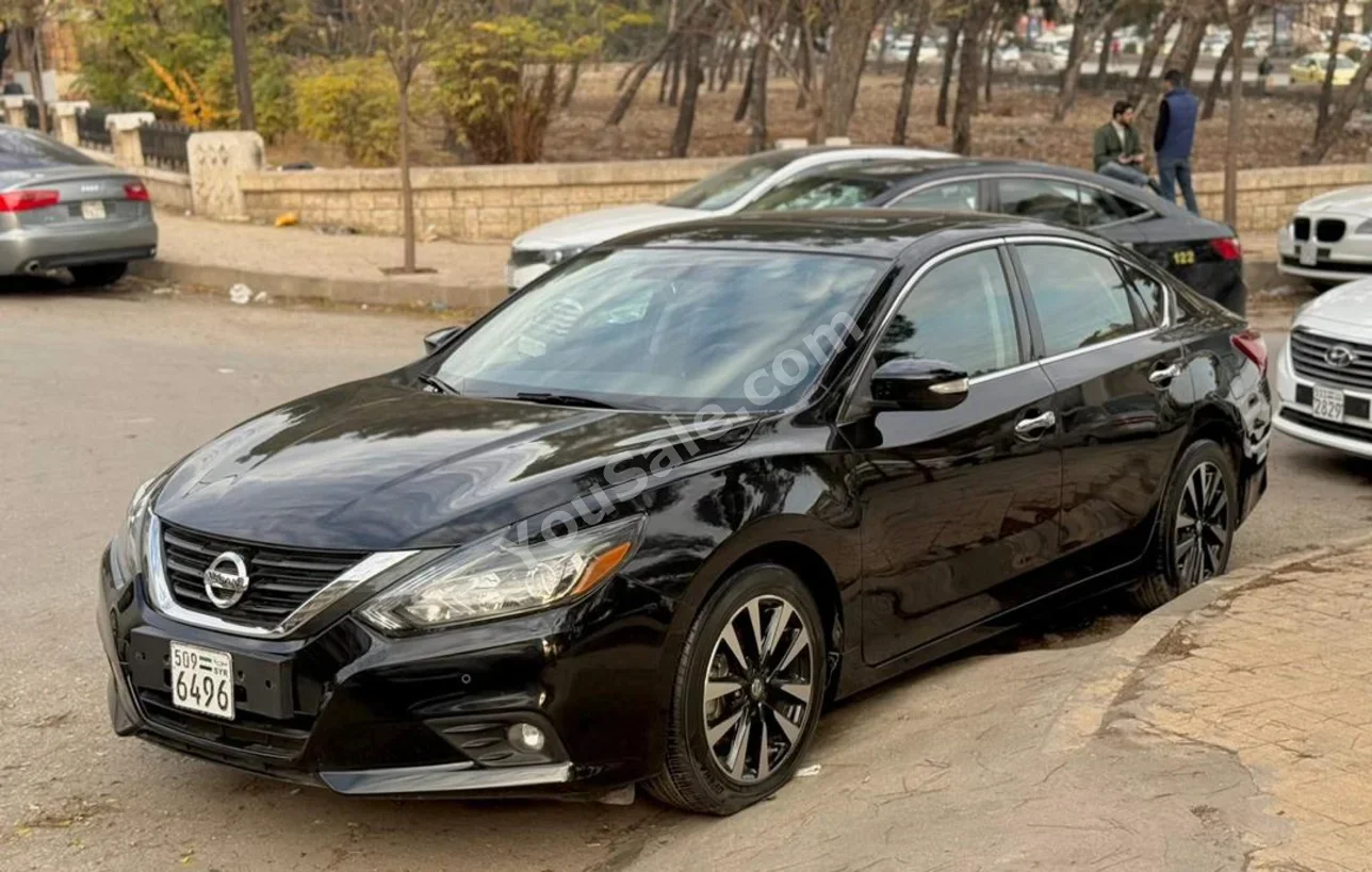 Nissan  Altima  2018  Automatic  110,000 km  4 Cylinder  FWD  Sedan  Black  Gasoline