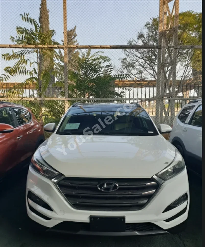 Hyundai  Tucson  2016  Automatic  170,000 km  4 Cylinder  FWD  SUV  White  Gasoline