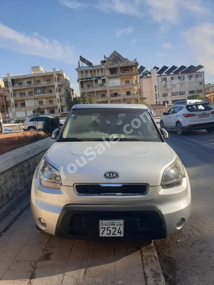 Kia  Soul  2.0  2011  Automatic  135,000 km  4 Cylinder  FWD  Hatchback  Silver  Gasoline