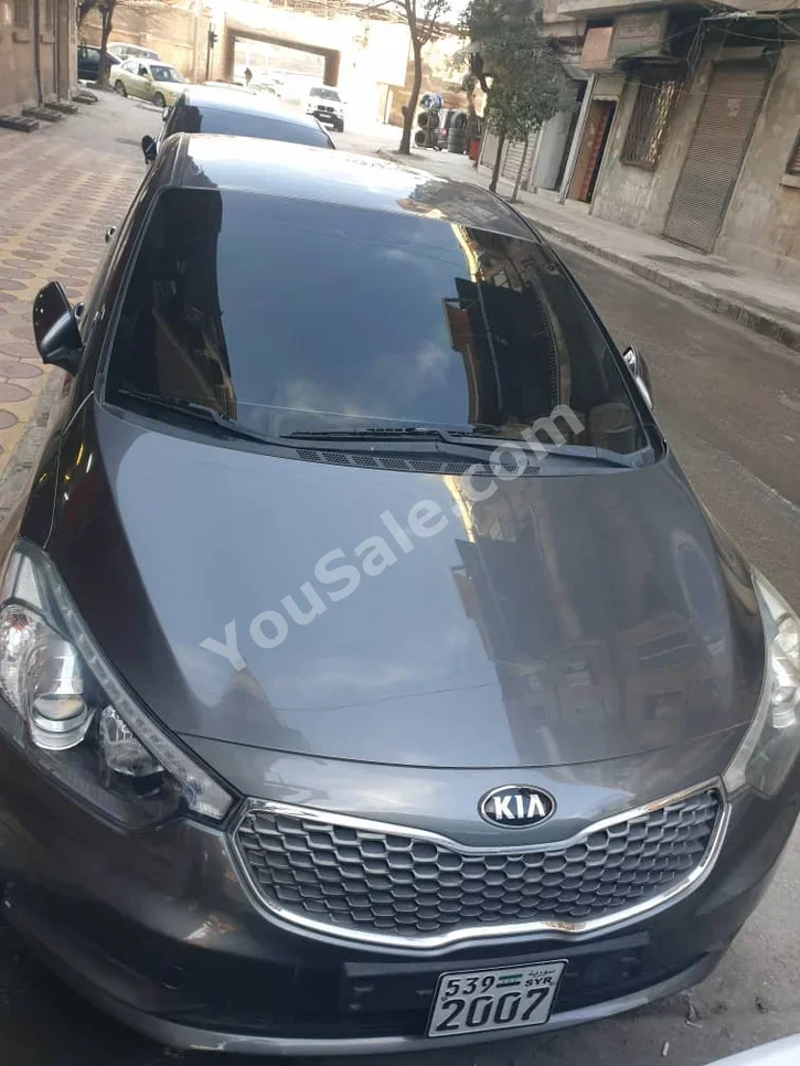 Kia K3 2013 Automatic 115,000 km 4 Cylinder FWD Sedan Dark Gray Gasoline