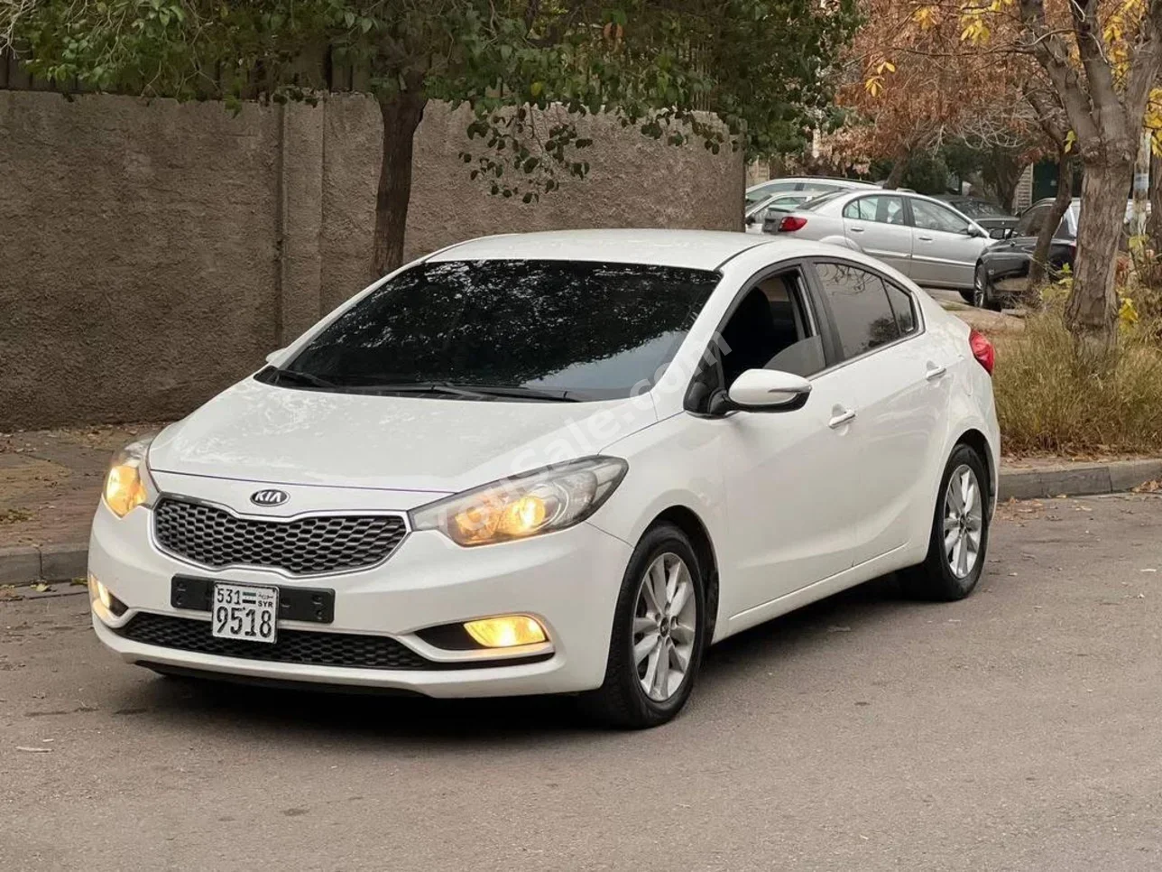 Kia  K3  2013  Automatic  103,000 km  4 Cylinder  FWD  Sedan  White  Gasoline