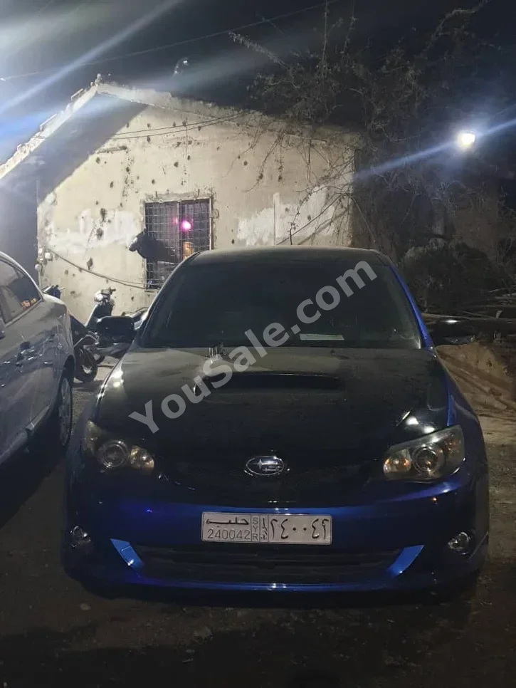 Subaru  WRX  STI  2010  Manual  282,000 km  4 Cylinder  FWD  Sedan  Blue  Gasoline