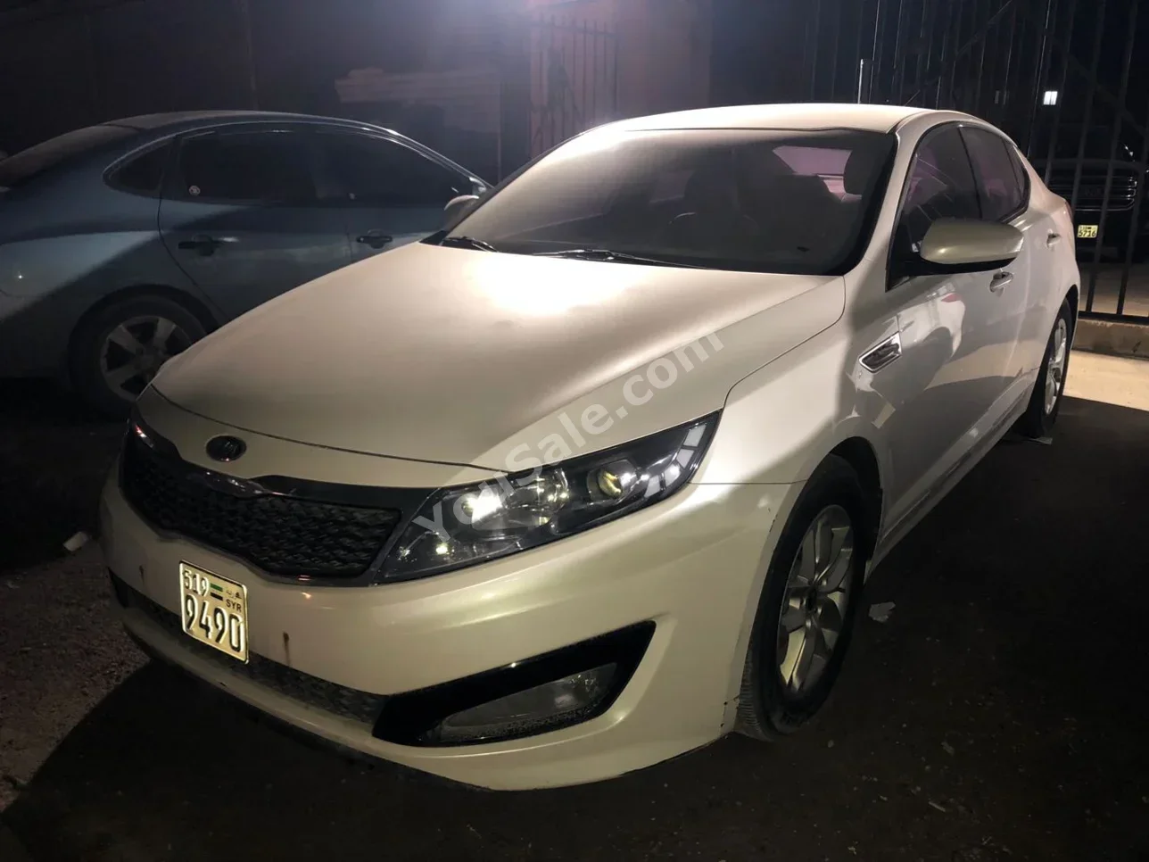 Kia  Optima  2011  Automatic  165,000 km  4 Cylinder  FWD  Sedan  White  Gasoline
