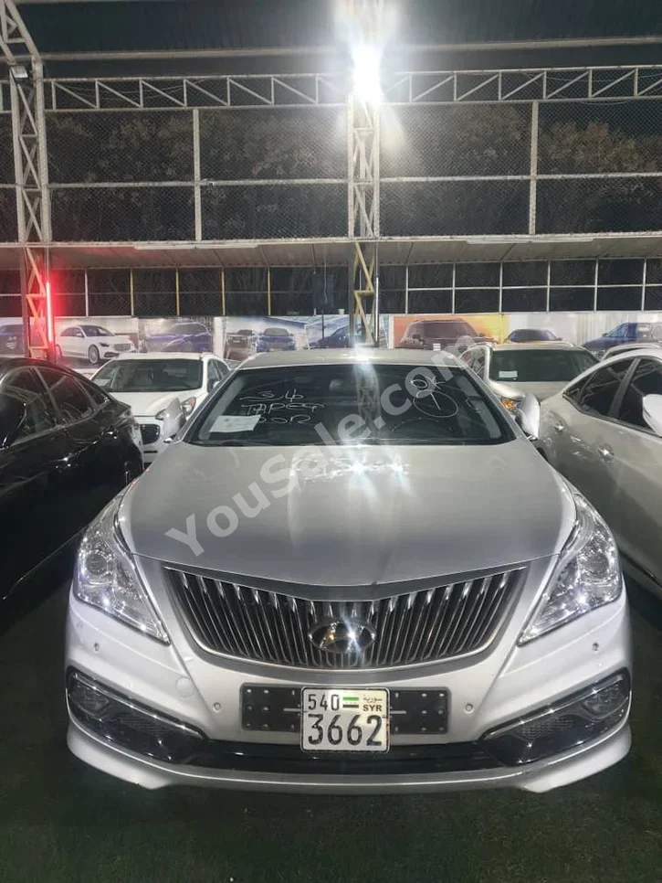 Hyundai  Grandeur  2012  Automatic  177,000 km  4 Cylinder  FWD  Sedan  Silver  Gasoline