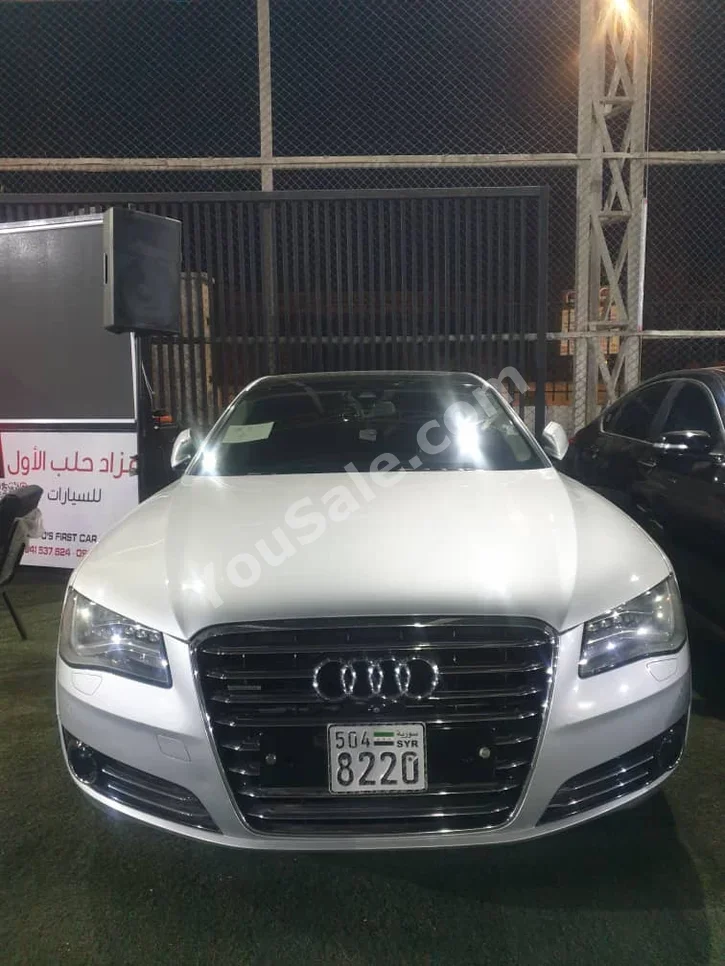 Audi  A8  L  2014  Automatic  212,000 km  8 Cylinder  4WD  Sedan  Silver  Gasoline