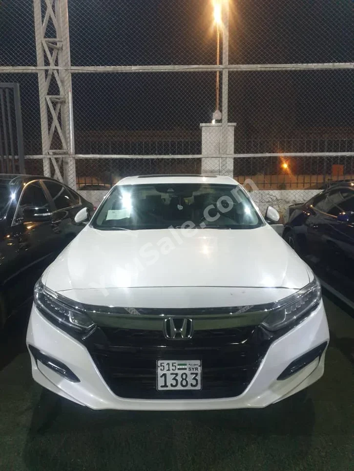 Honda  Accord  2018  Automatic  253,000 km  4 Cylinder  RWD  Sedan  White  Gasoline