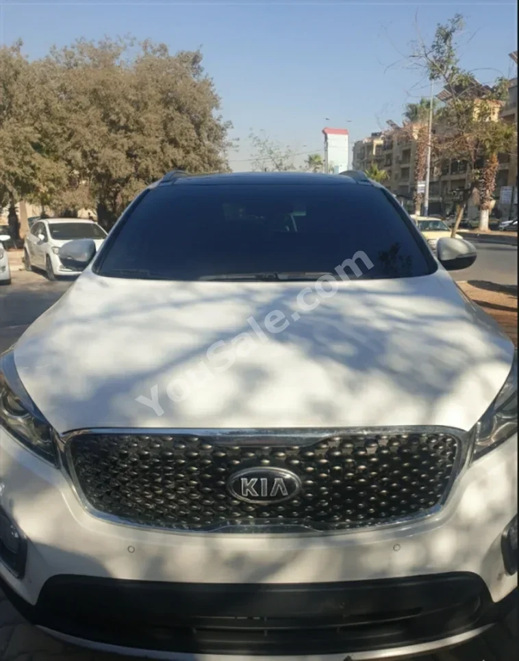 Kia  Sorento  2015  Automatic  212,000 km  4 Cylinder  FWD  SUV  White  Gasoline